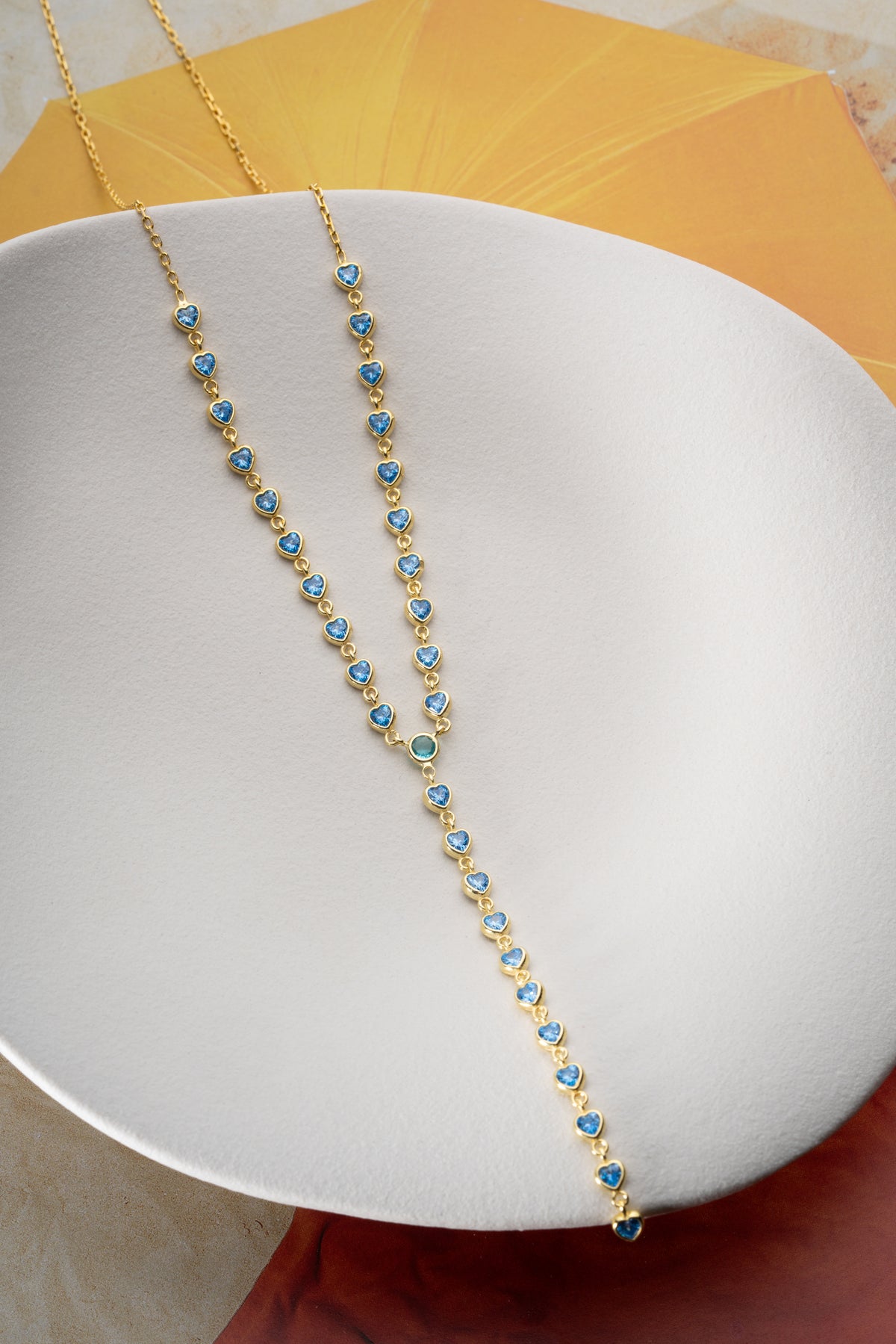 Blue Heart Crystal Lariat Necklace in Gold