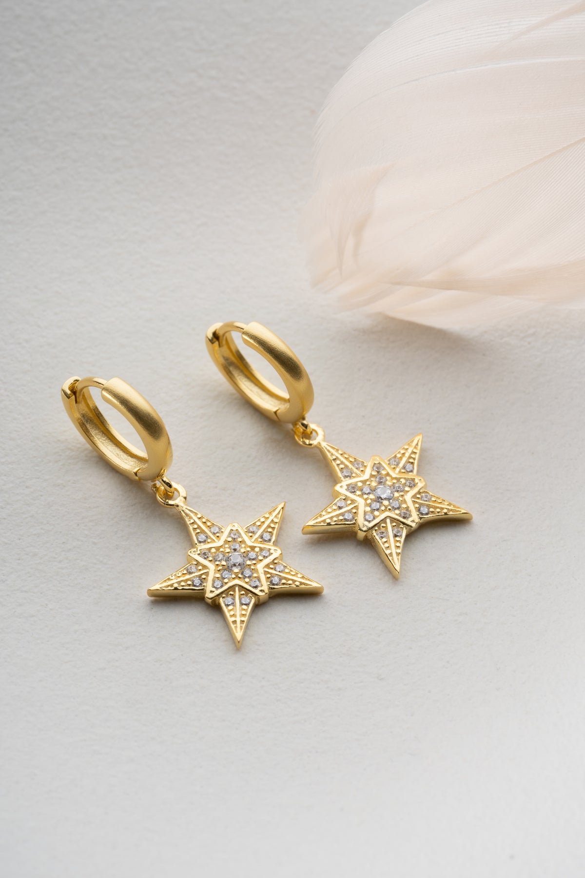 Pave Star Dangle Earrings in Gold
