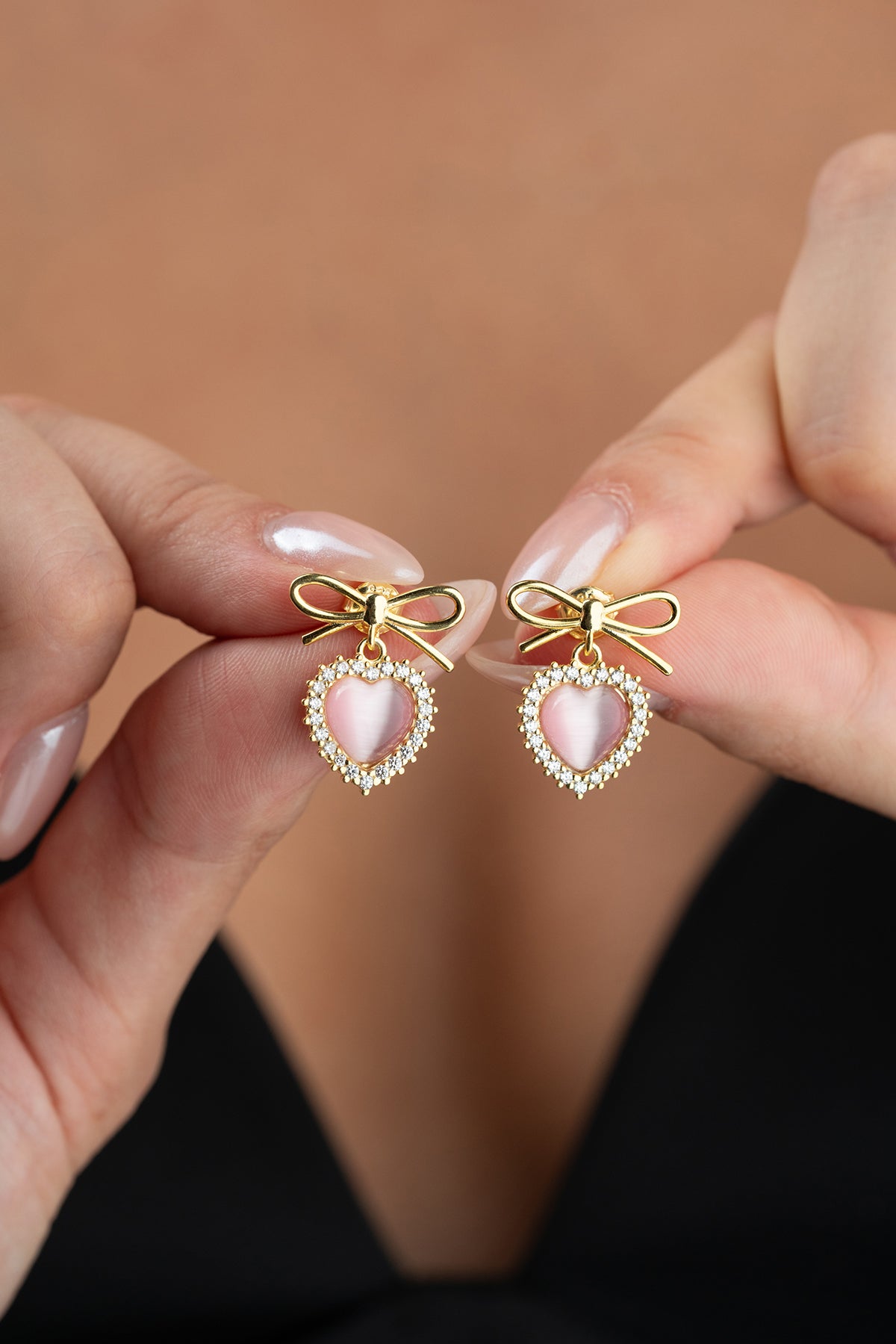 Bow and Heart Drop Earrings in Gold