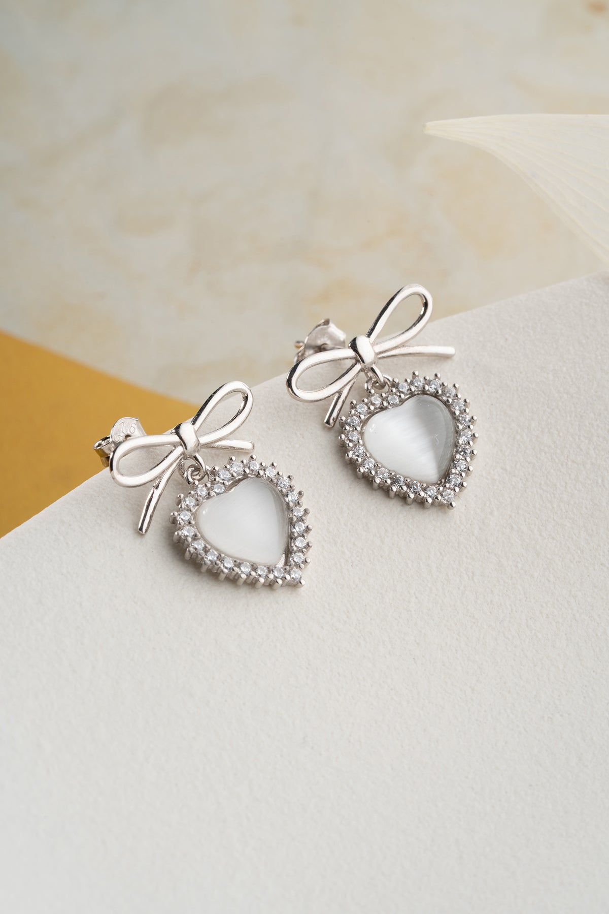 Silver Bow Heart Drop Earrings