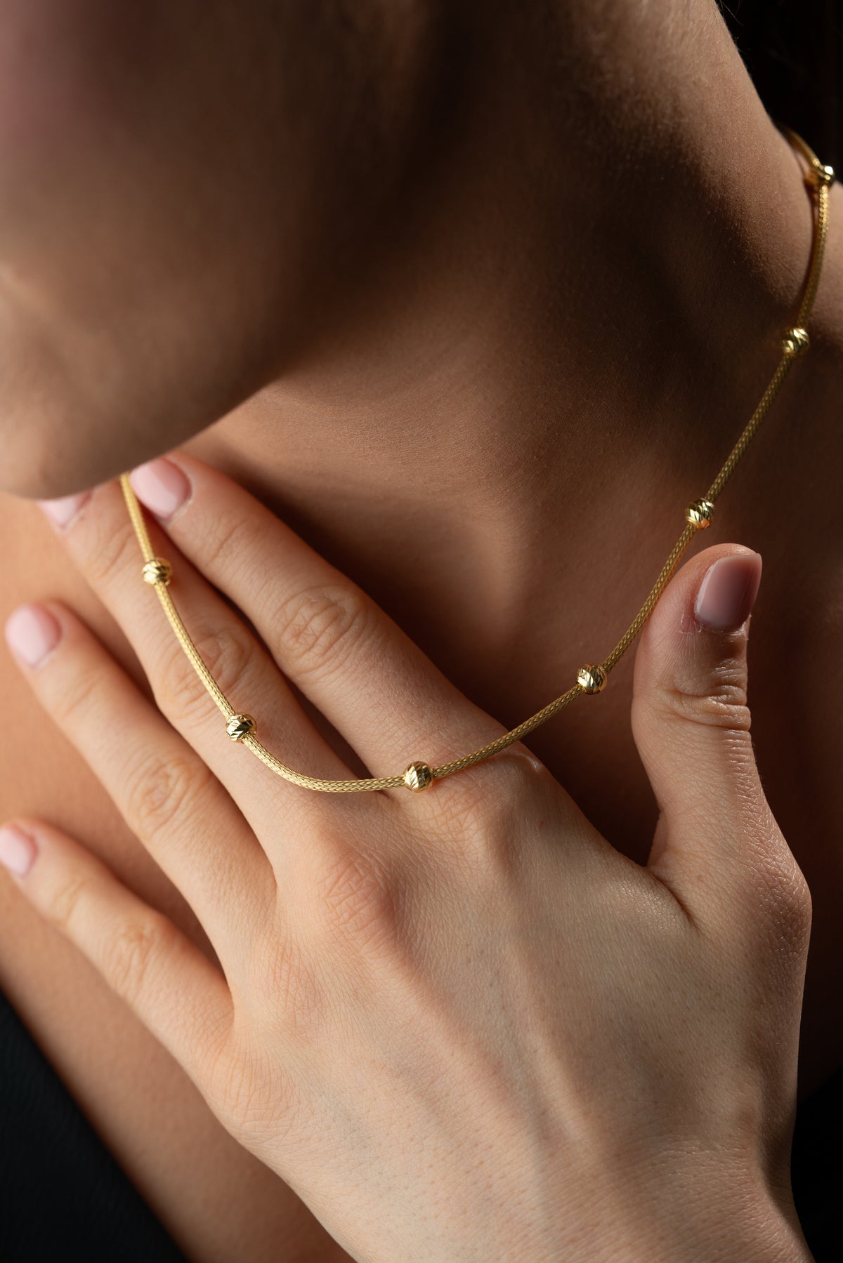 Gold Snake Chain Necklace with Sparkling Bead Stations