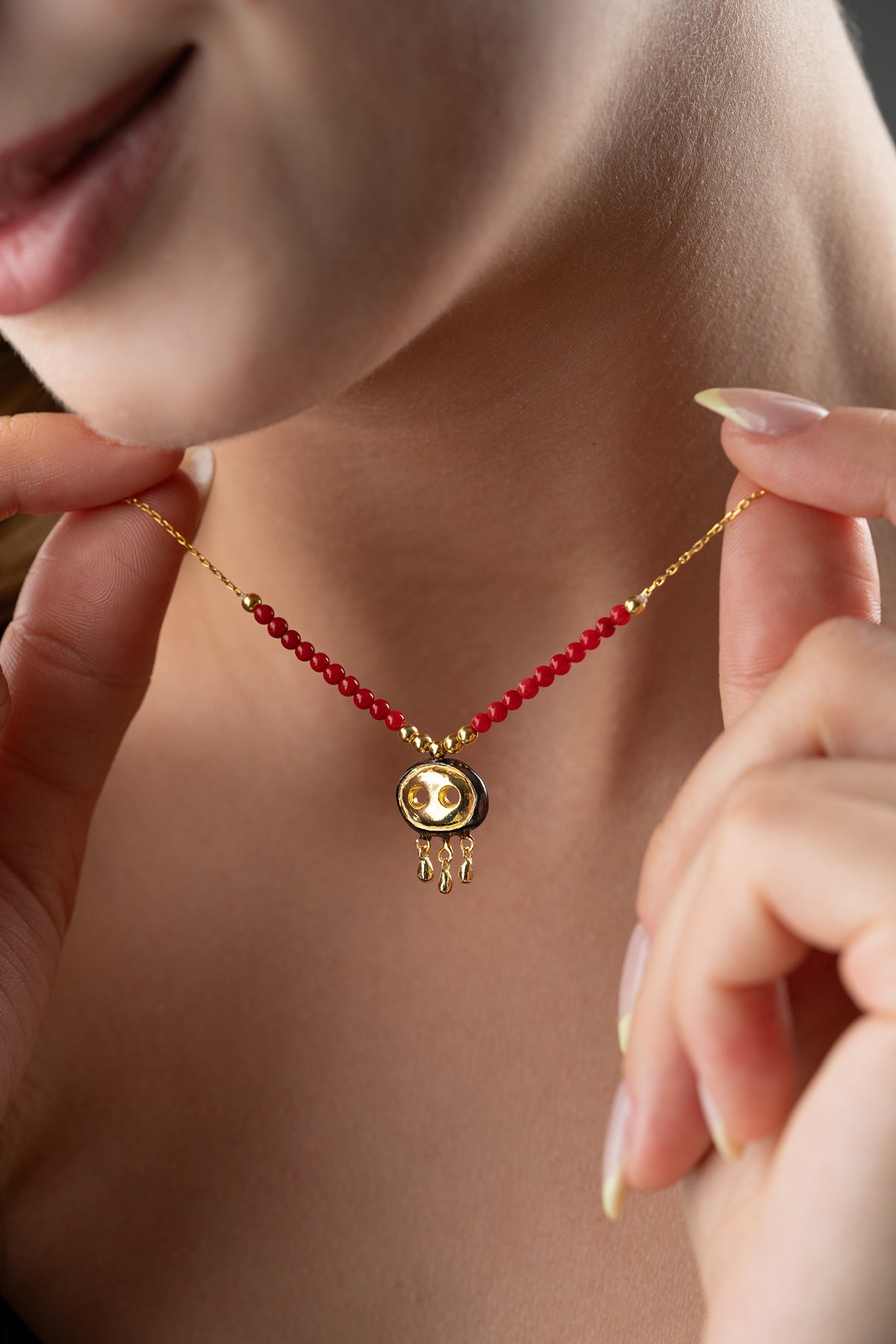 Red Beaded Necklace with Gold Fringe Charm