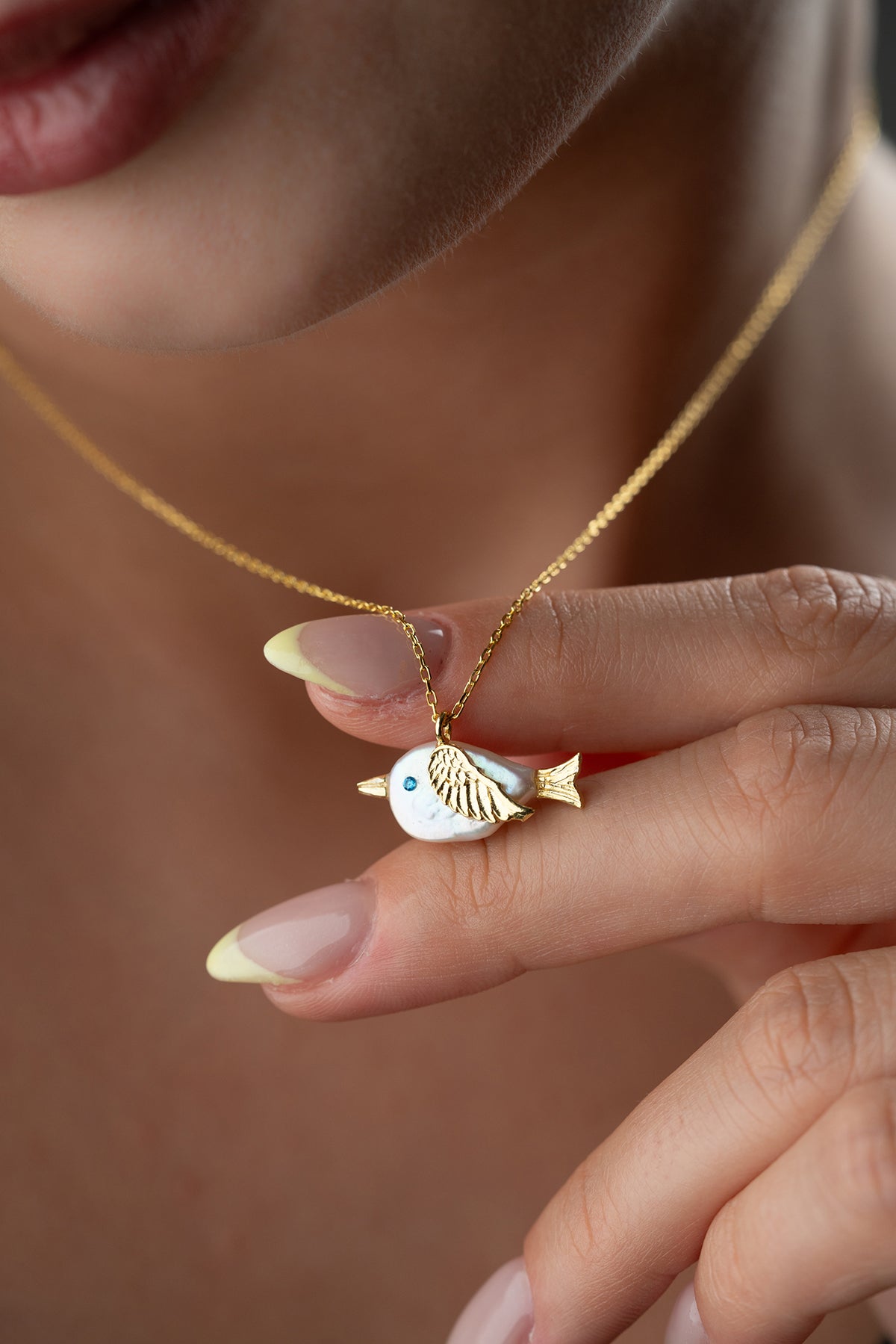Pearl Bird Charm Necklace in Gold