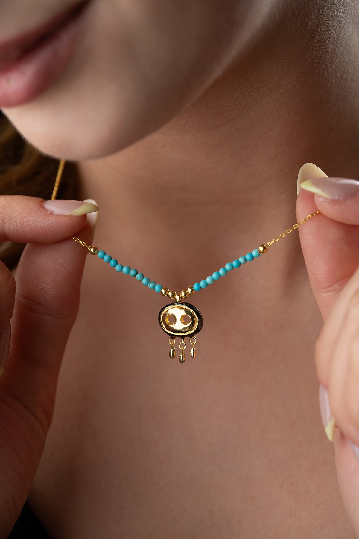 Turquoise Beaded Necklace with Gold Fringe Charm
