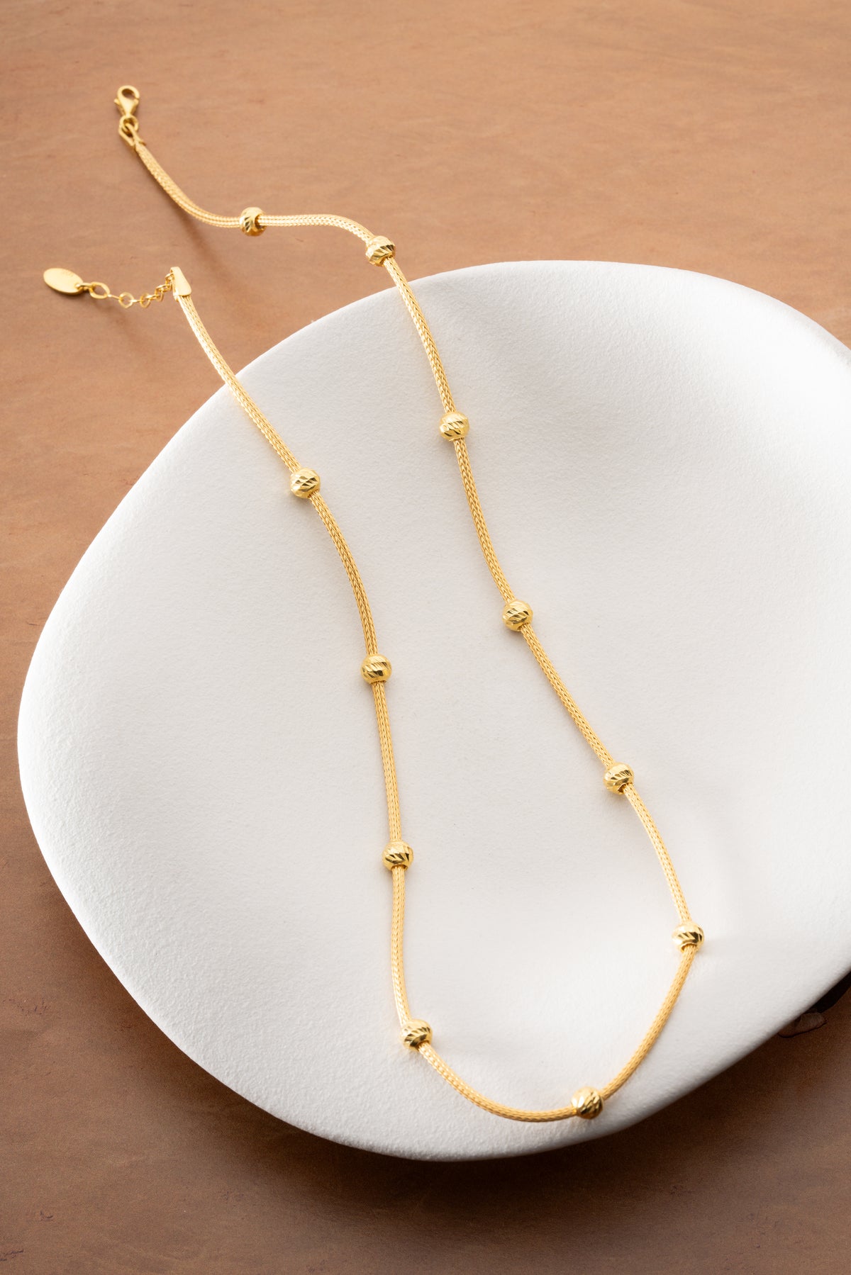 Gold Snake Chain Necklace with Sparkling Bead Stations