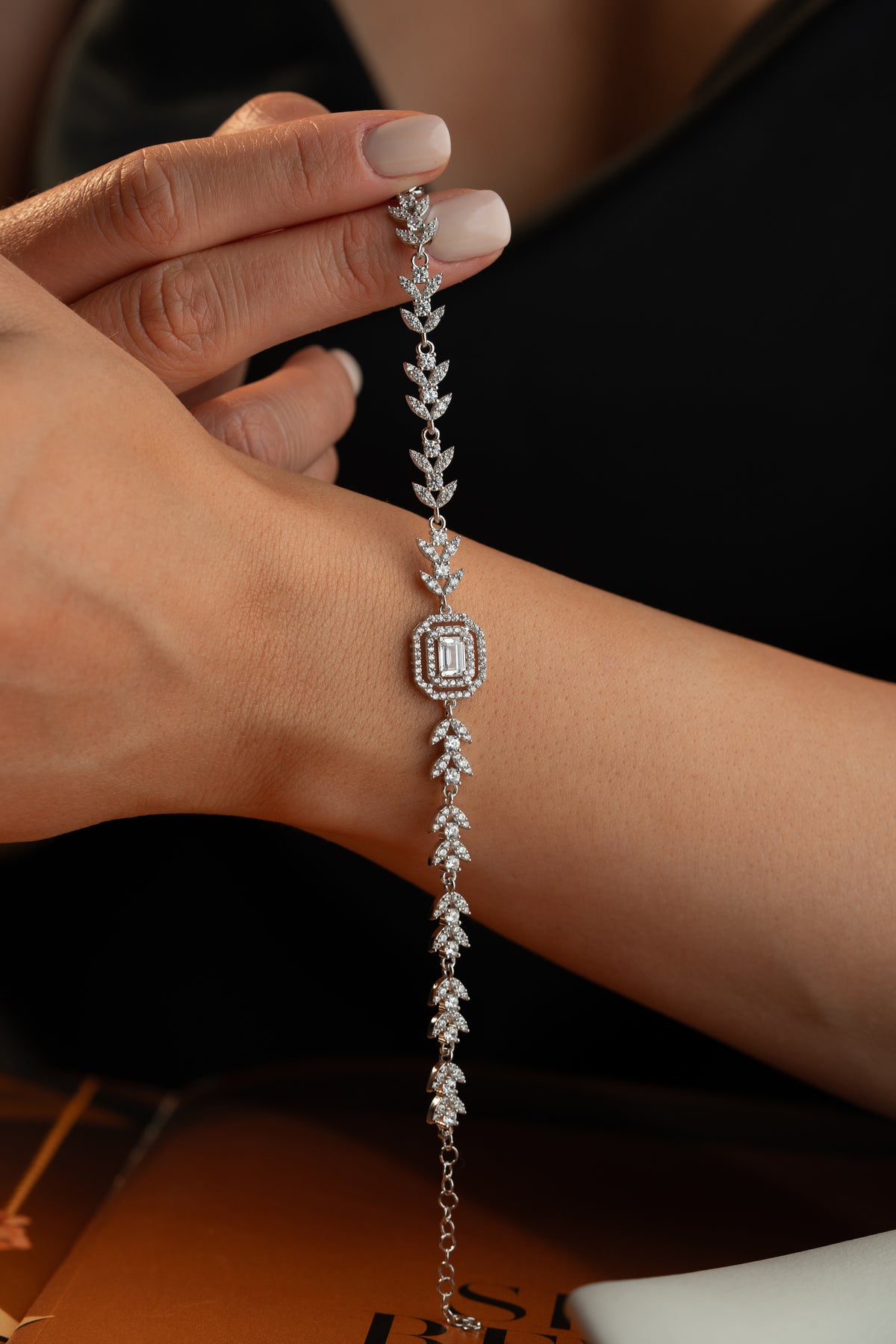 Leaf Vine Tennis Bracelet with Emerald Cut Halo
