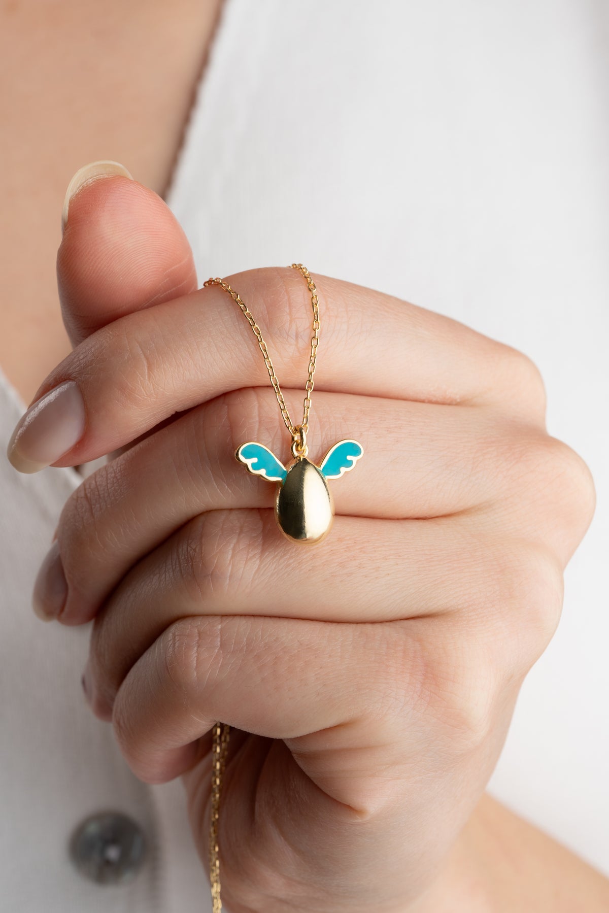 Pearl Egg Necklace with Turquoise Enamel Wings