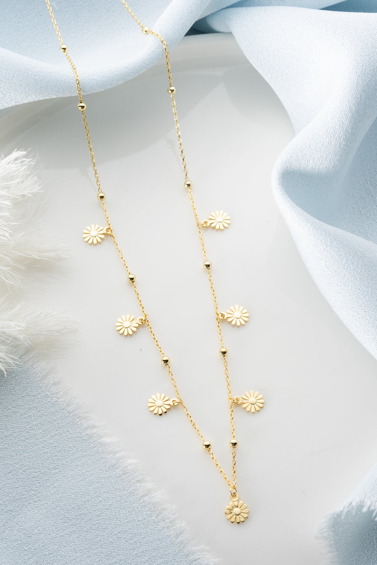 Layered Daisy Charm Necklace in Gold