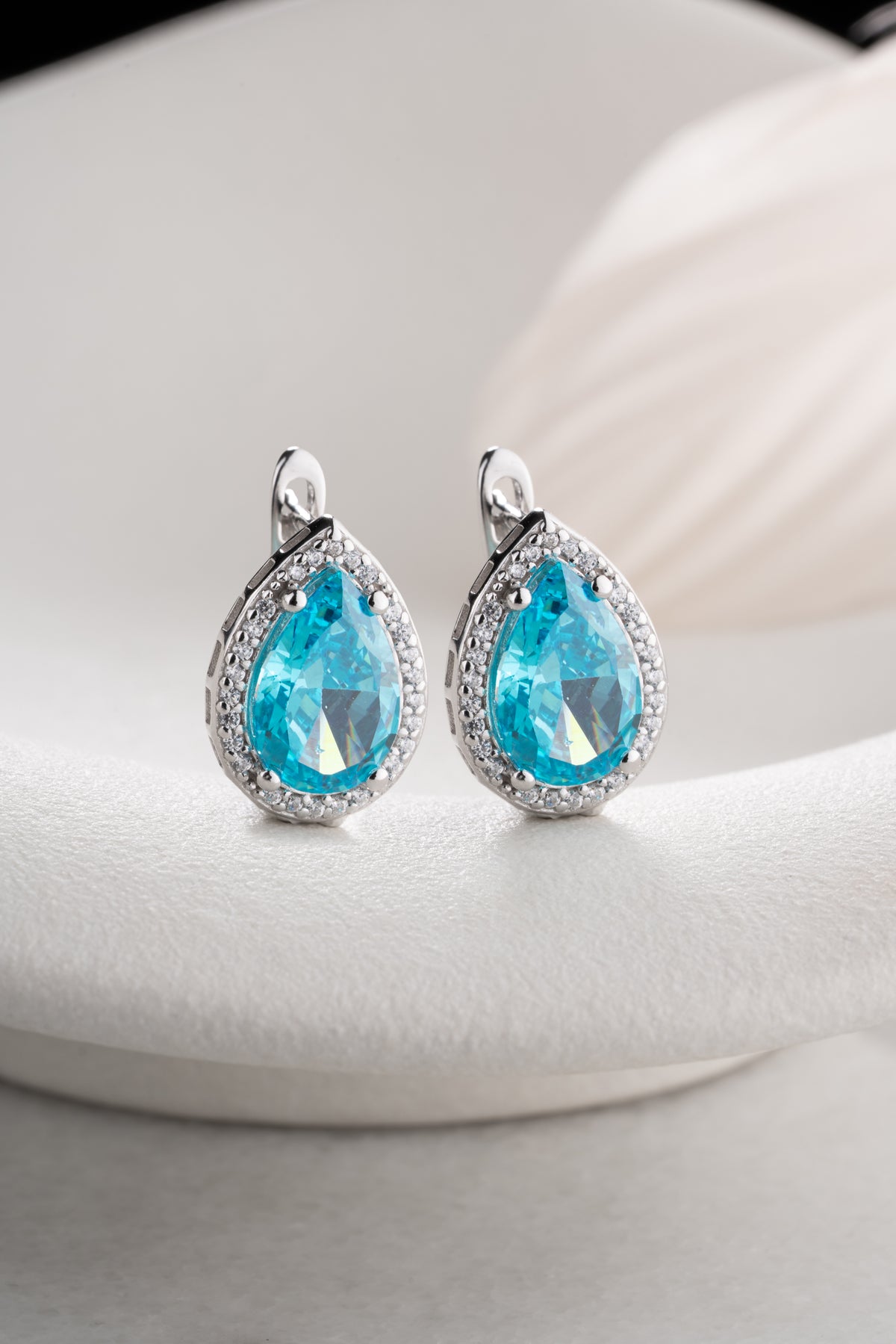 Aquamarine Teardrop Halo Earrings in Silver