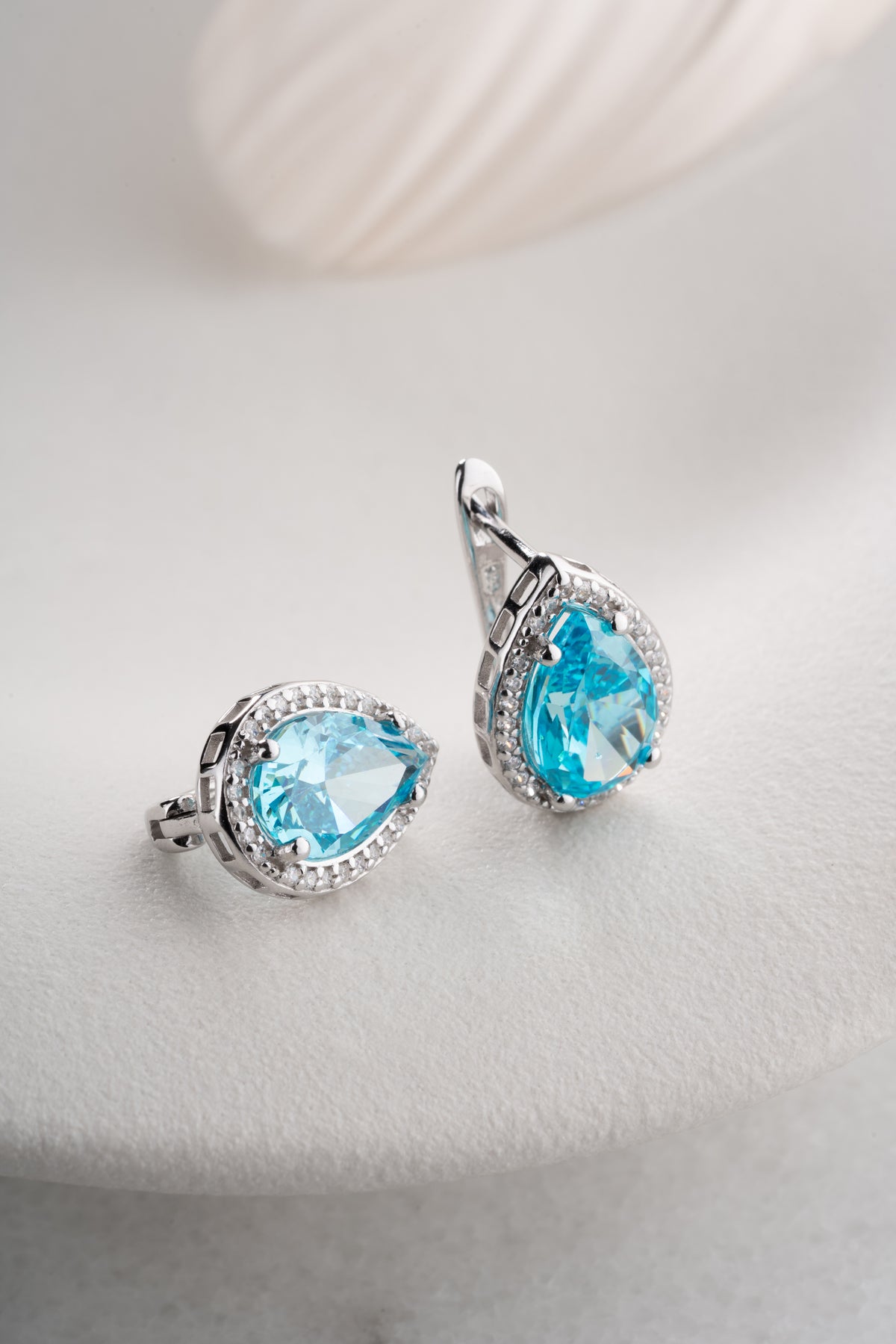 Aquamarine Teardrop Halo Earrings in Silver