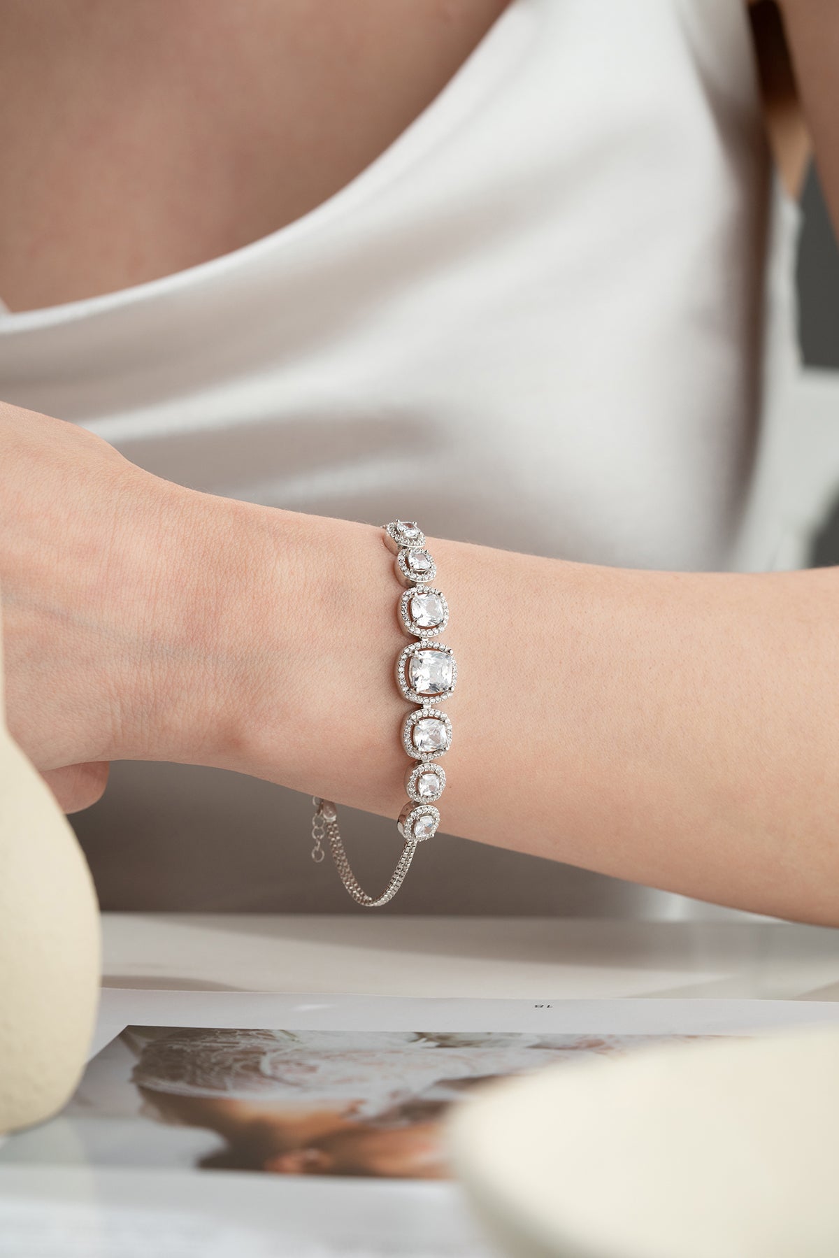 Graduated Crystal Halo Tennis Bracelet
