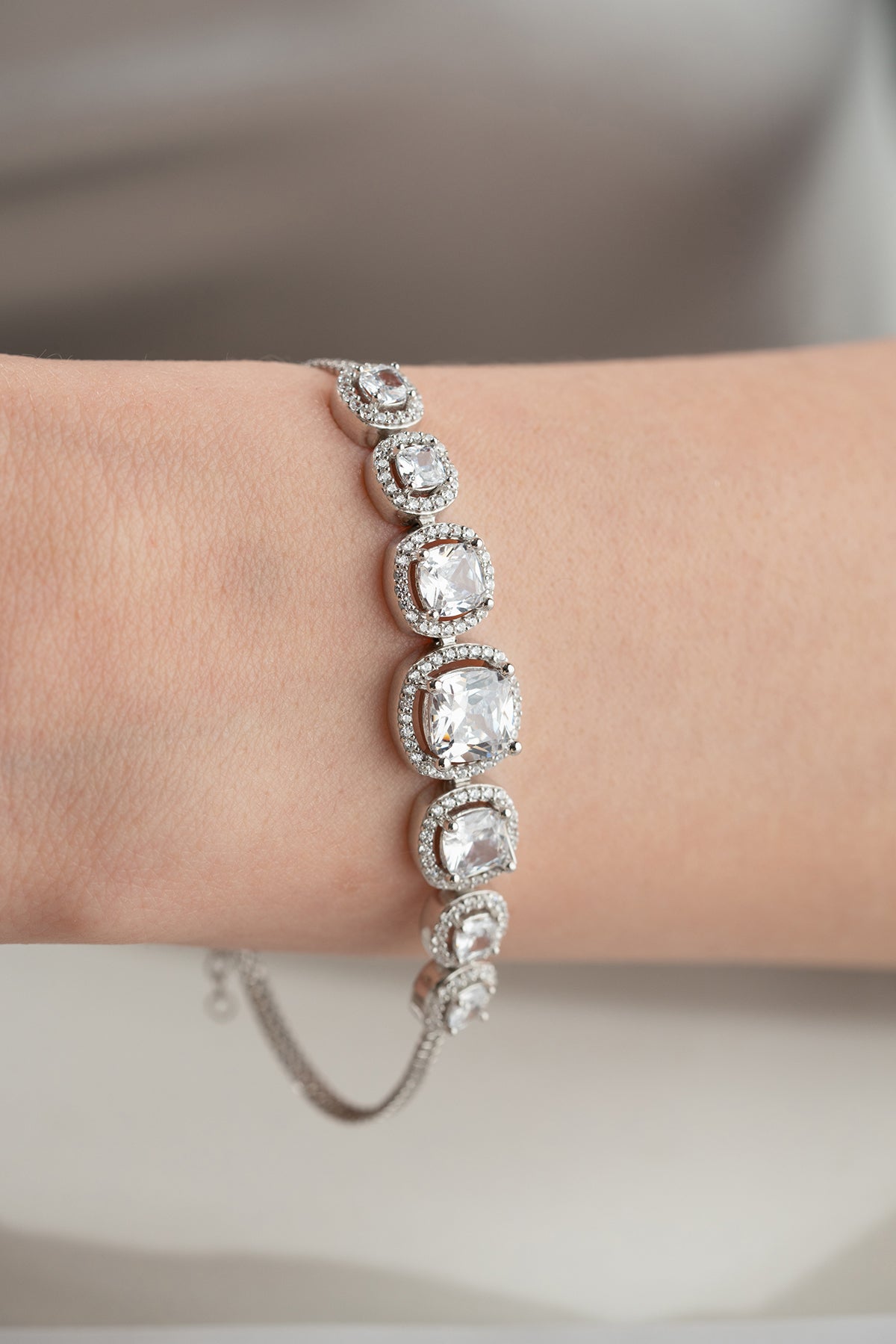 Graduated Crystal Halo Tennis Bracelet