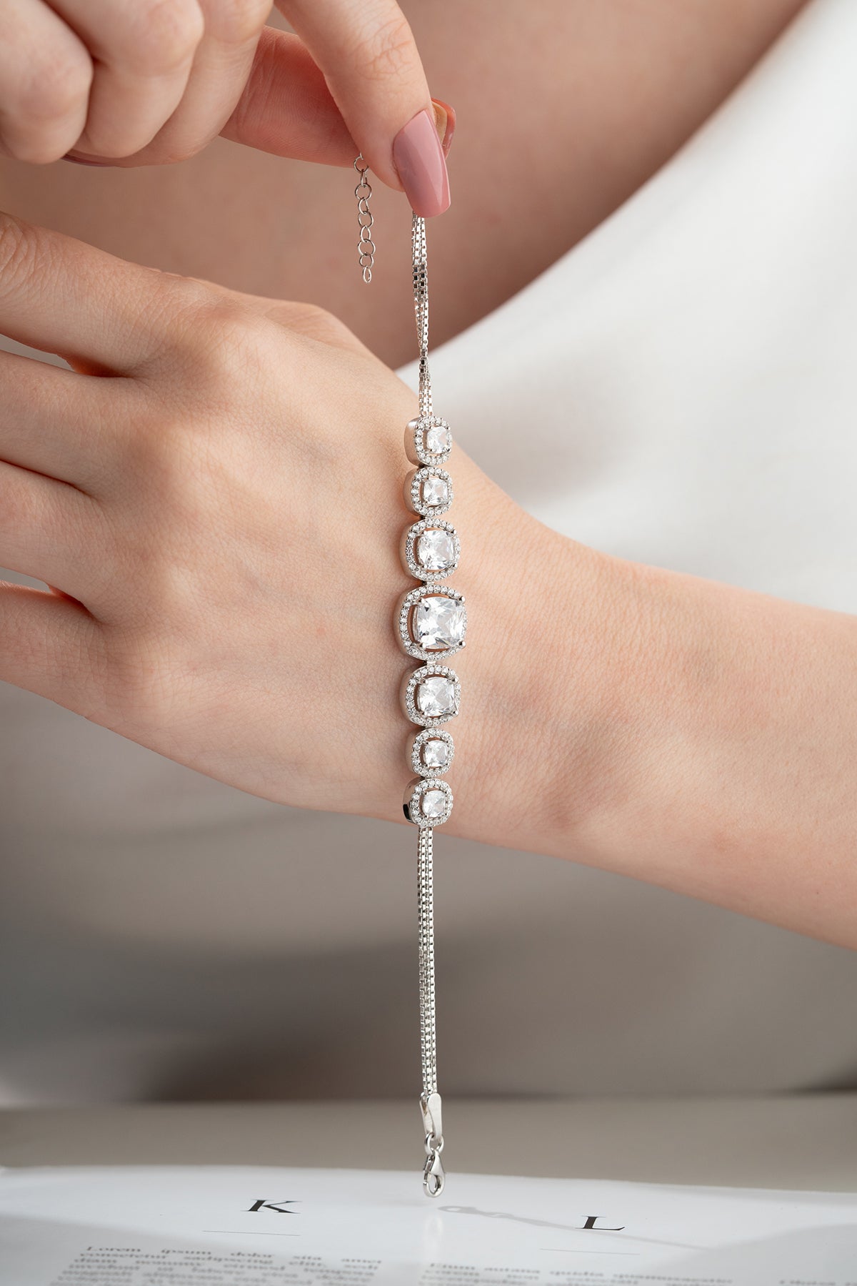 Graduated Crystal Halo Tennis Bracelet