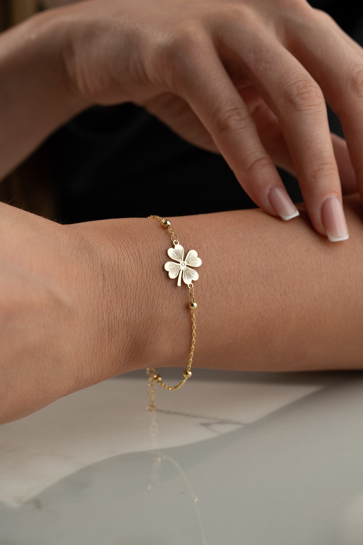Four Leaf Clover Charm Bracelet in Gold