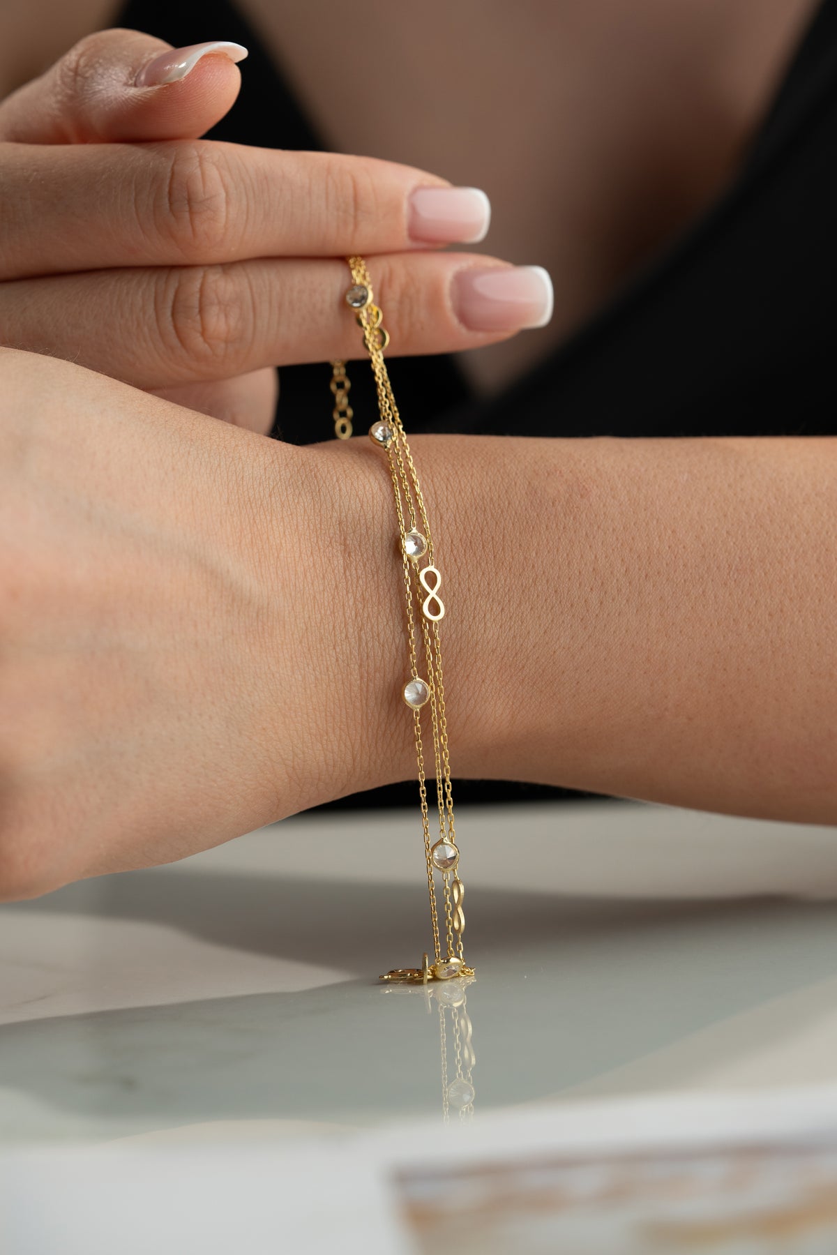 Triple Chain Infinity Bracelet in Gold