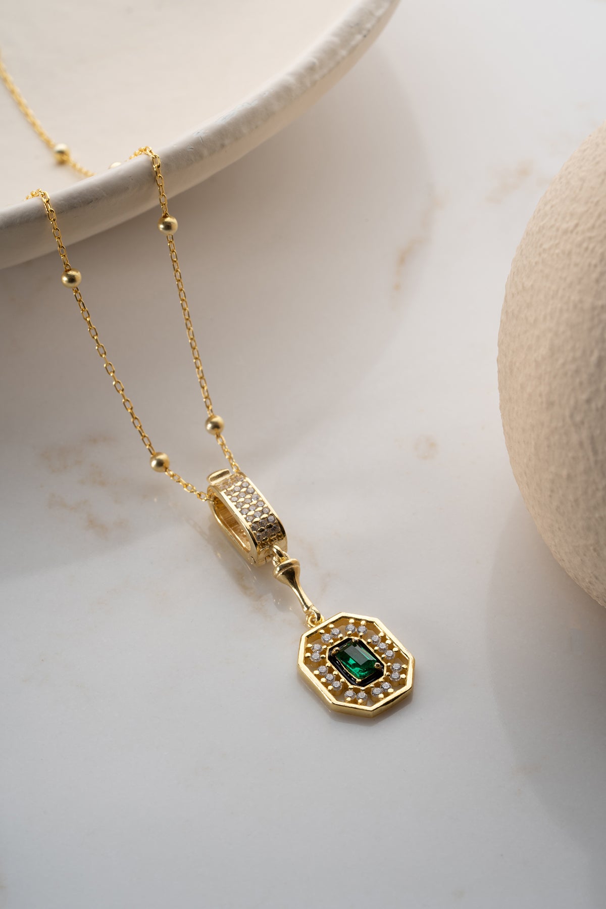 Gold Emerald Cut Halo Necklace