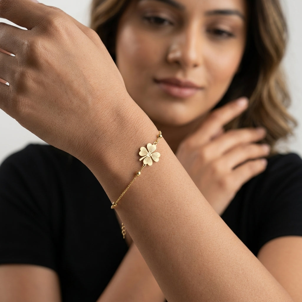 Four Leaf Clover Charm Bracelet in Gold