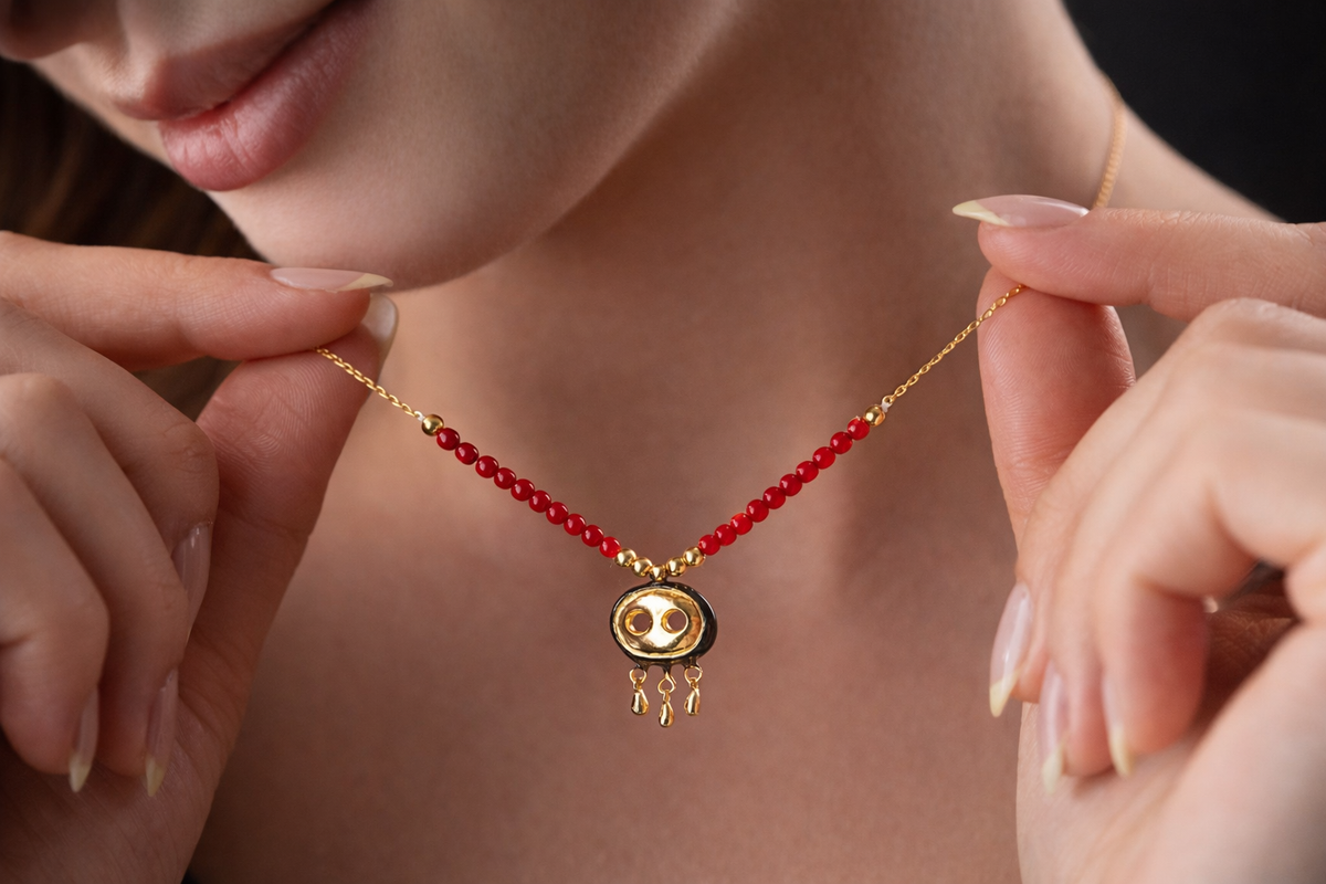 Red Beaded Necklace with Gold Fringe Charm