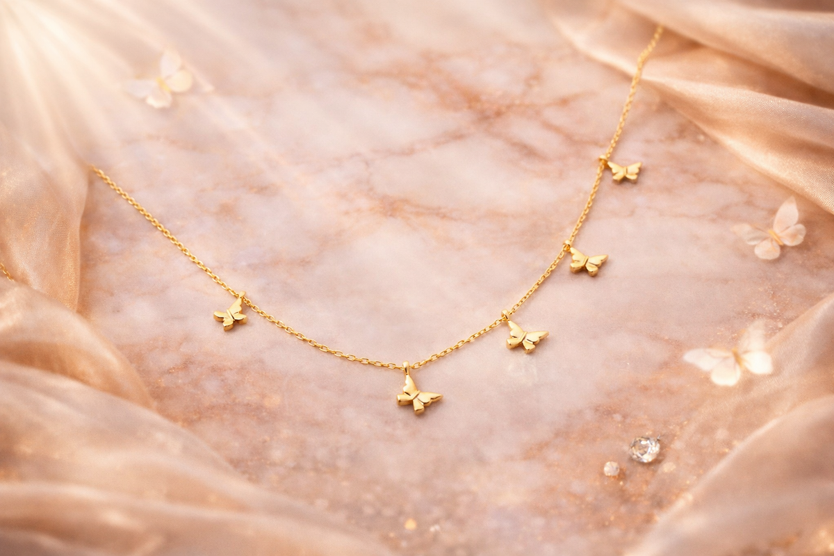 Butterfly Charm Station Necklace in Gold