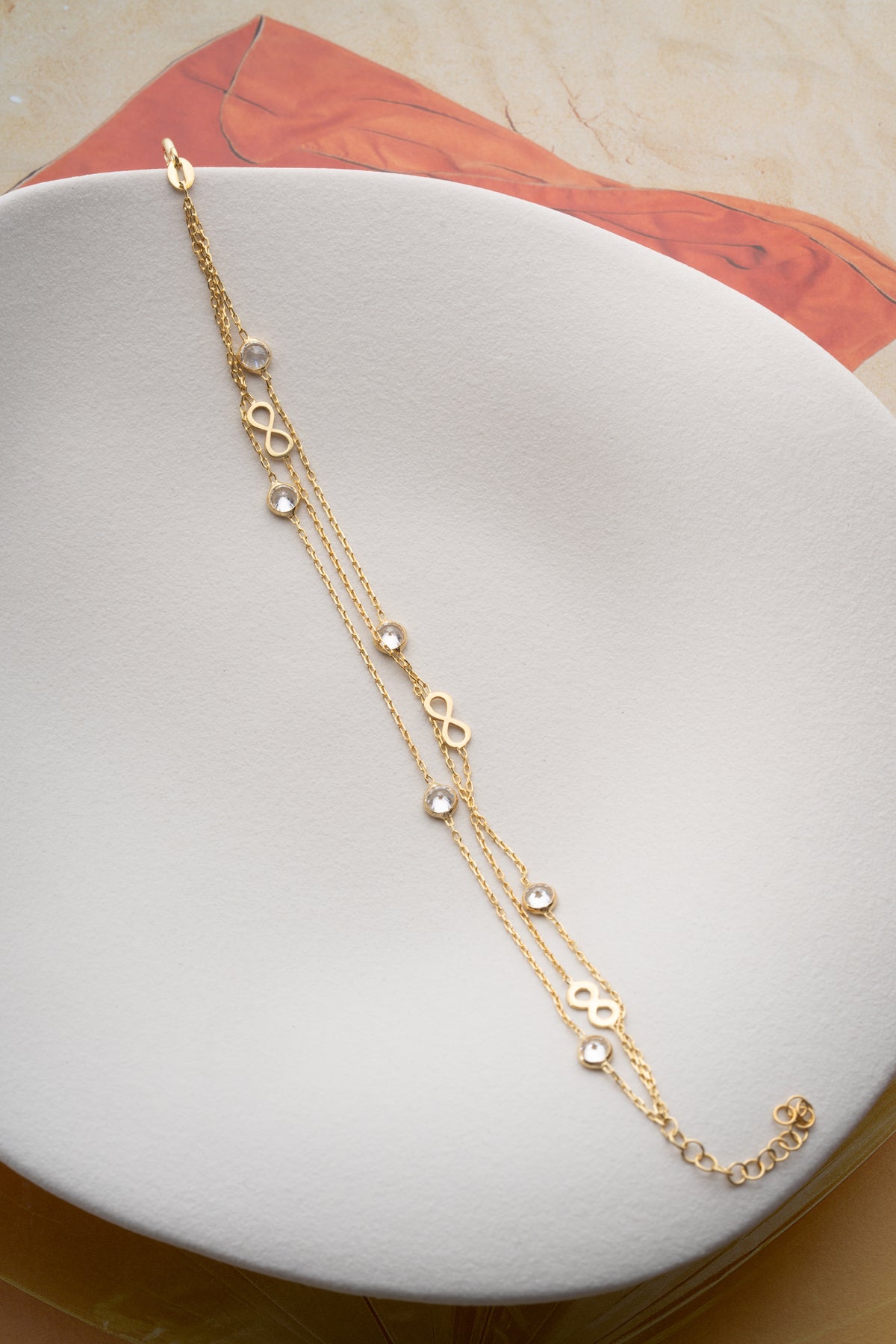 Triple Chain Infinity Bracelet in Gold