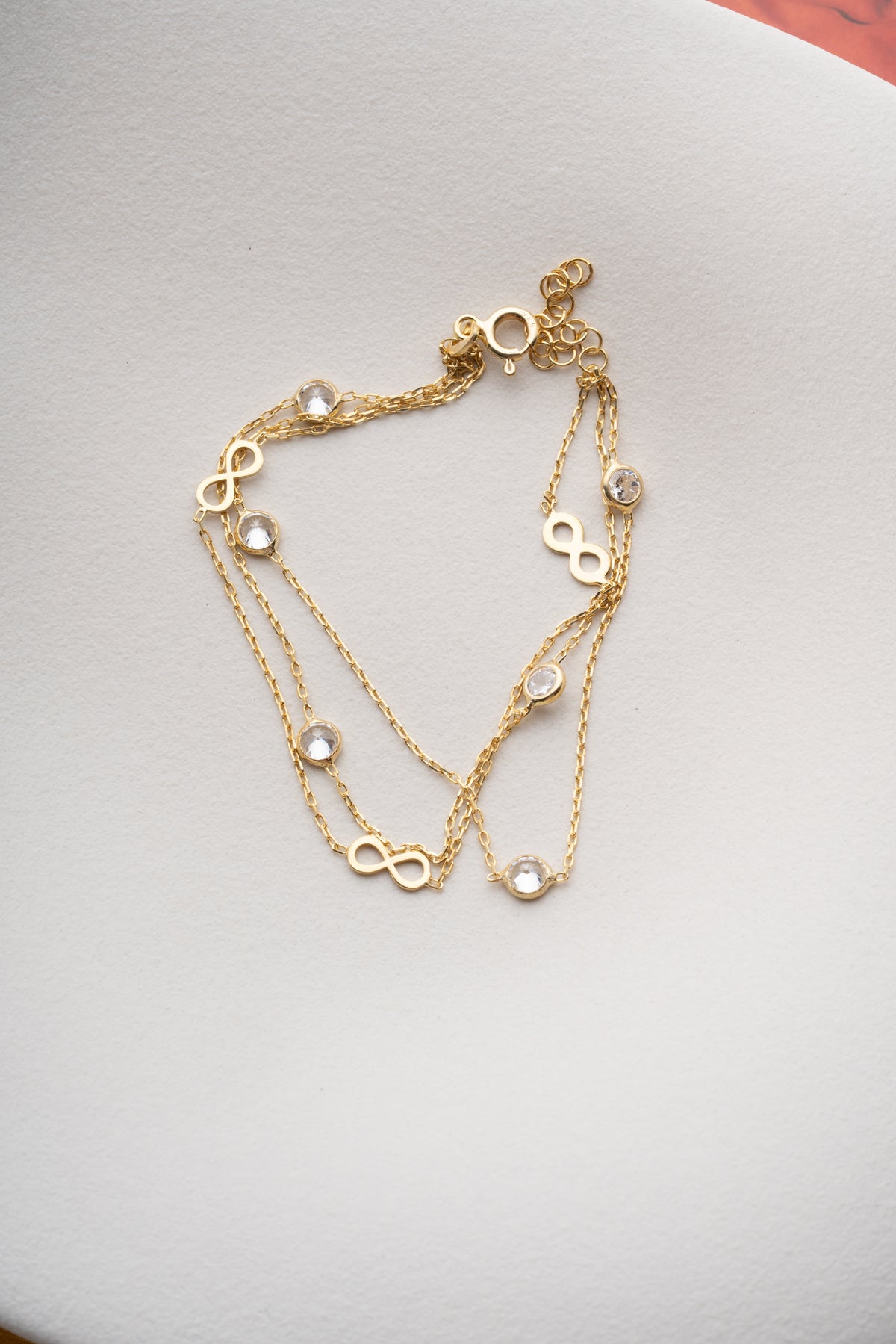 Triple Chain Infinity Bracelet in Gold