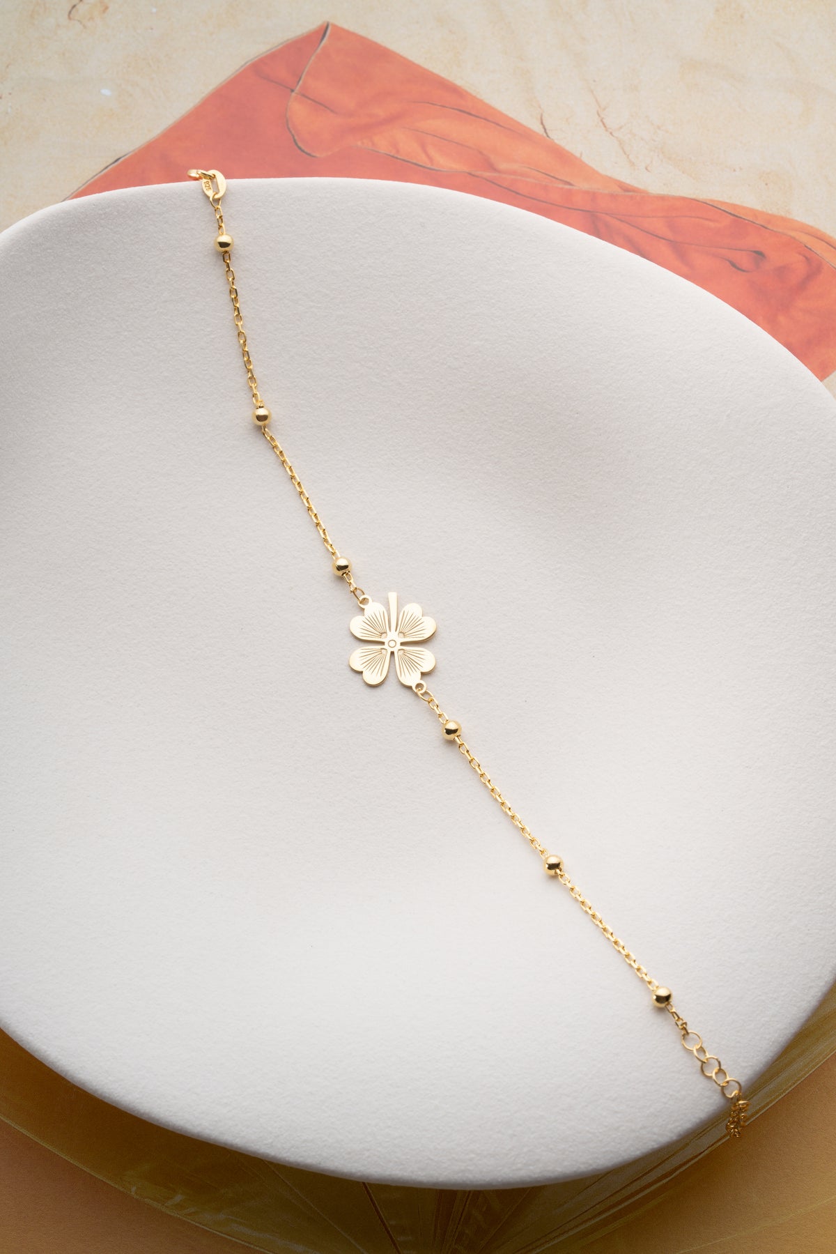 Four Leaf Clover Charm Bracelet in Gold