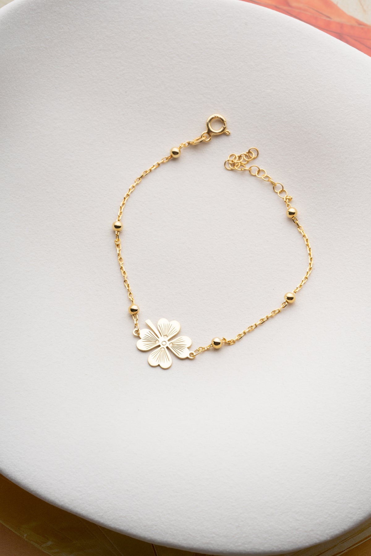 Four Leaf Clover Charm Bracelet in Gold