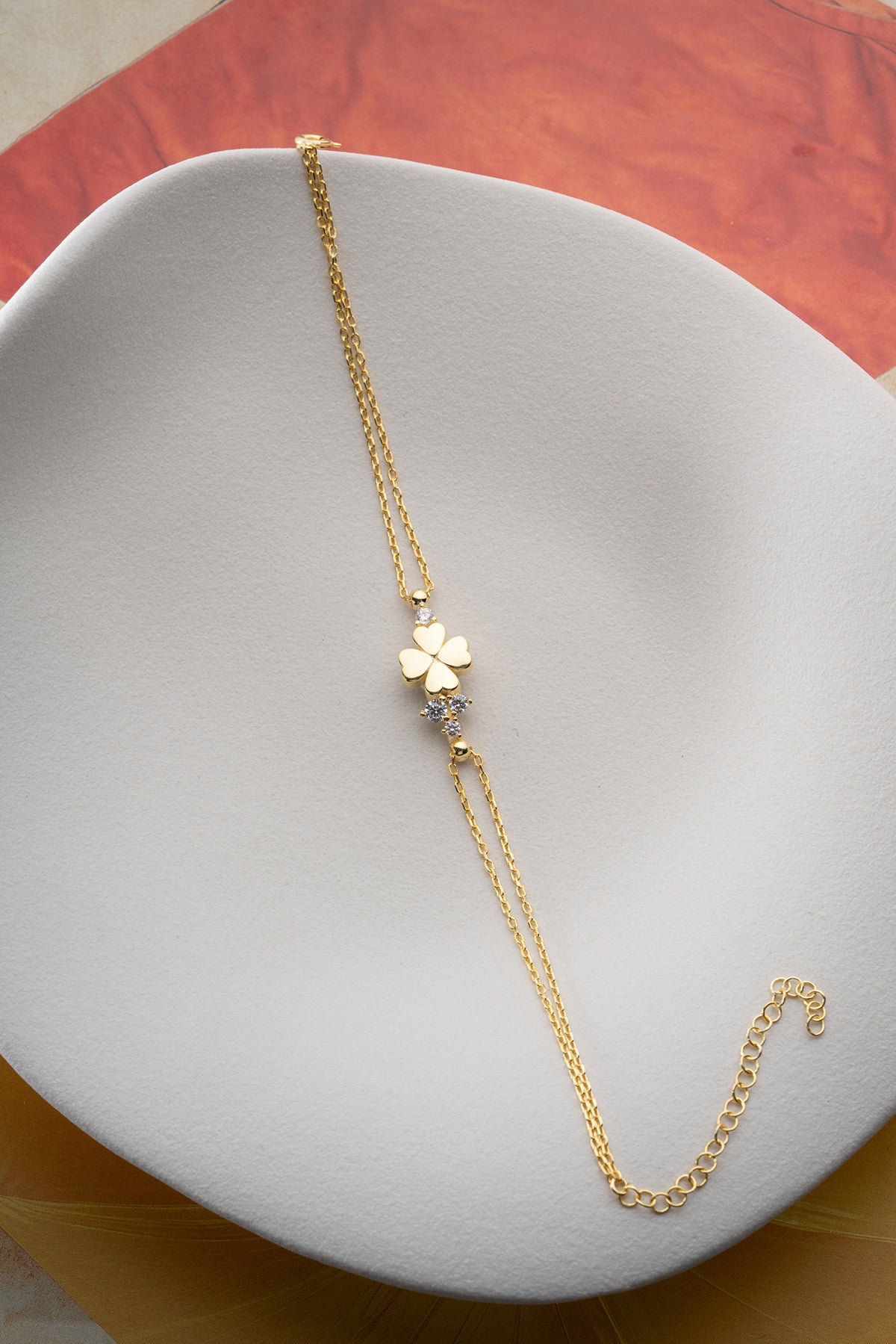 Four Leaf Clover Charm Bracelet in Gold