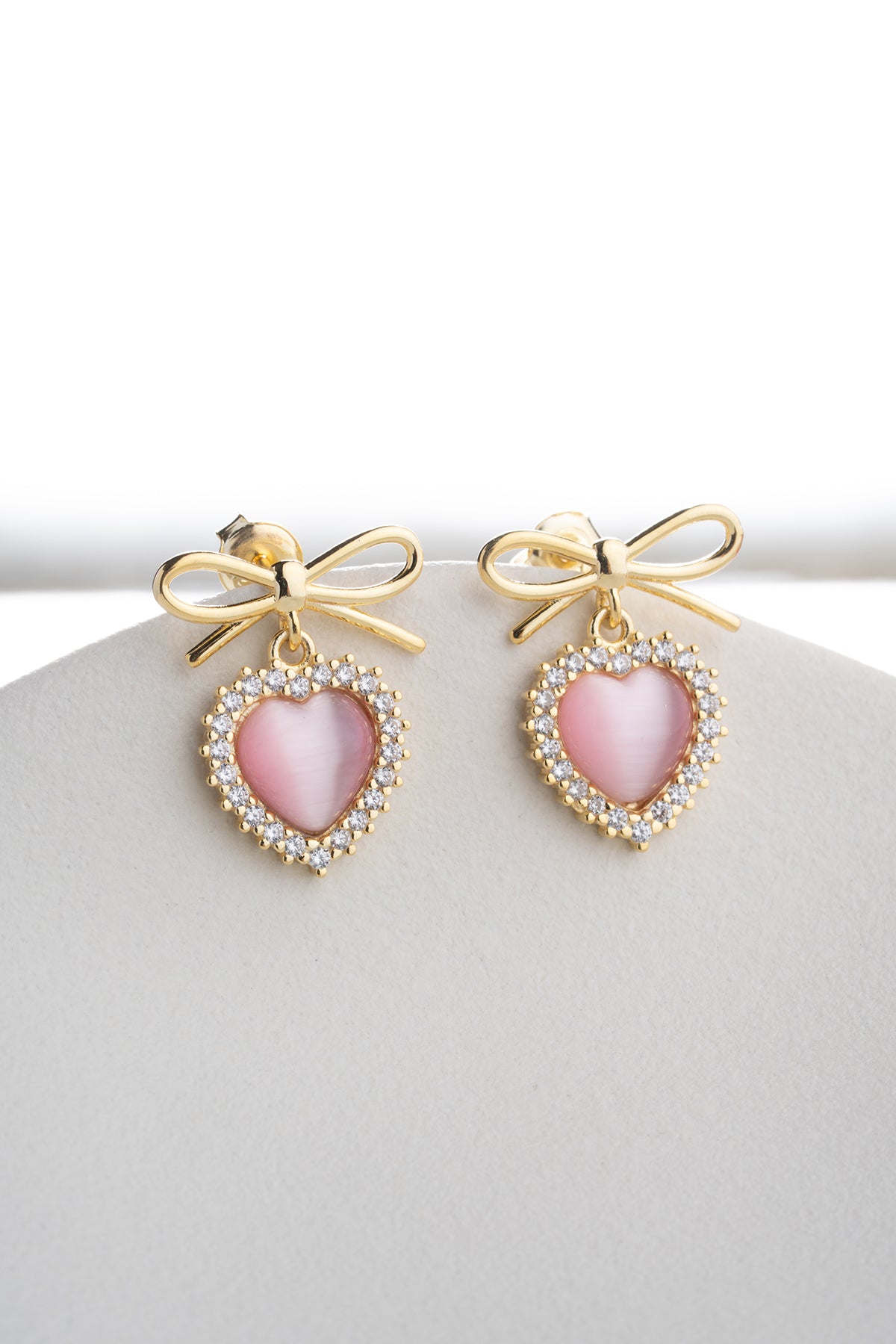 Bow and Heart Drop Earrings in Gold