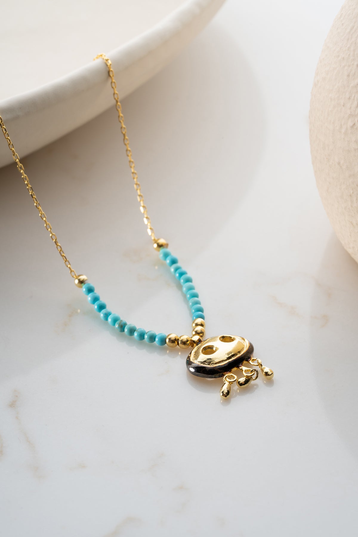 Turquoise Beaded Necklace with Gold Fringe Charm