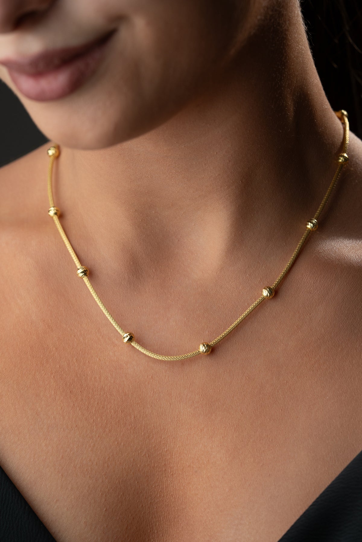 Gold Snake Chain Necklace with Sparkling Bead Stations
