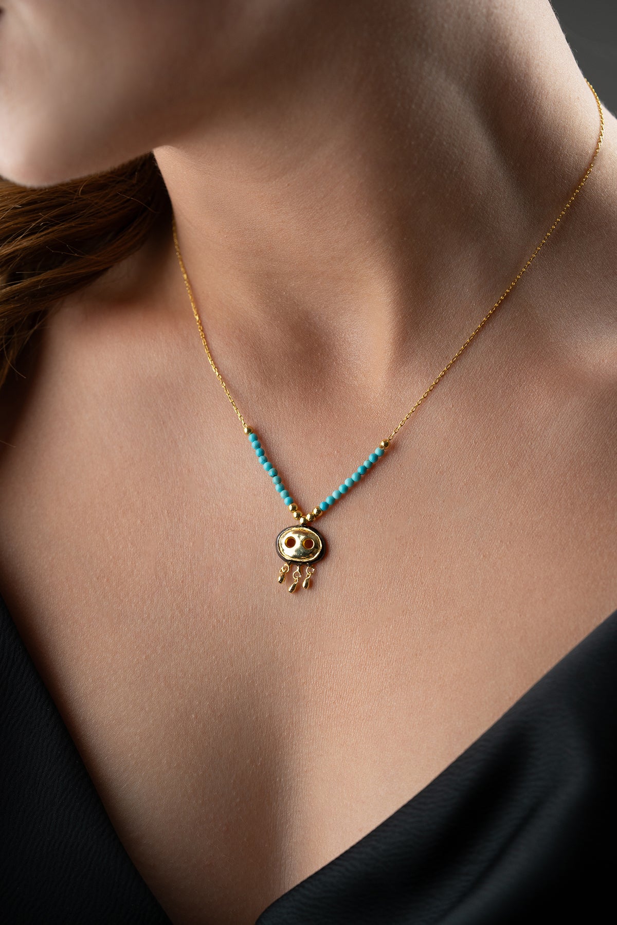 Turquoise Beaded Necklace with Gold Fringe Charm