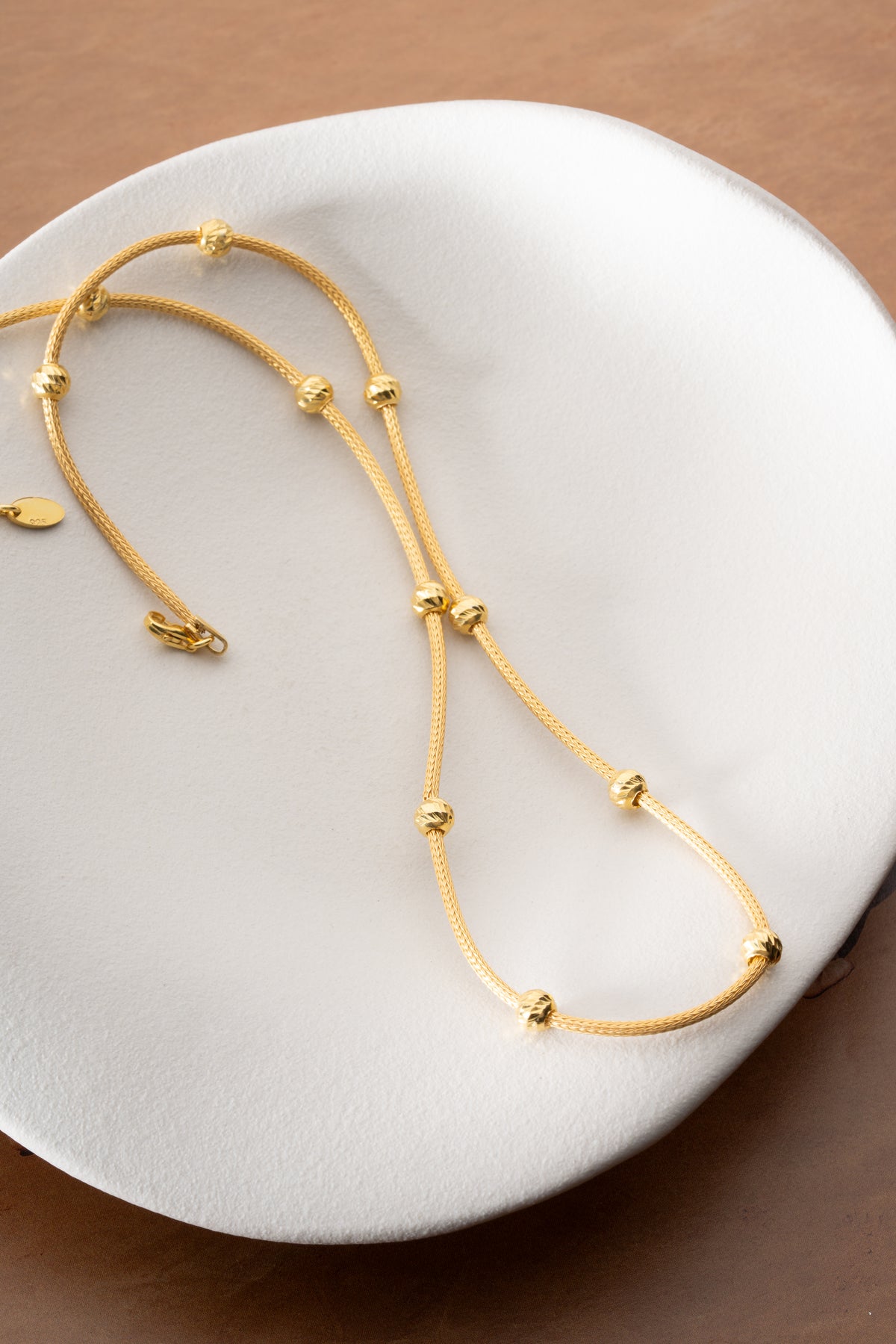 Gold Snake Chain Necklace with Sparkling Bead Stations