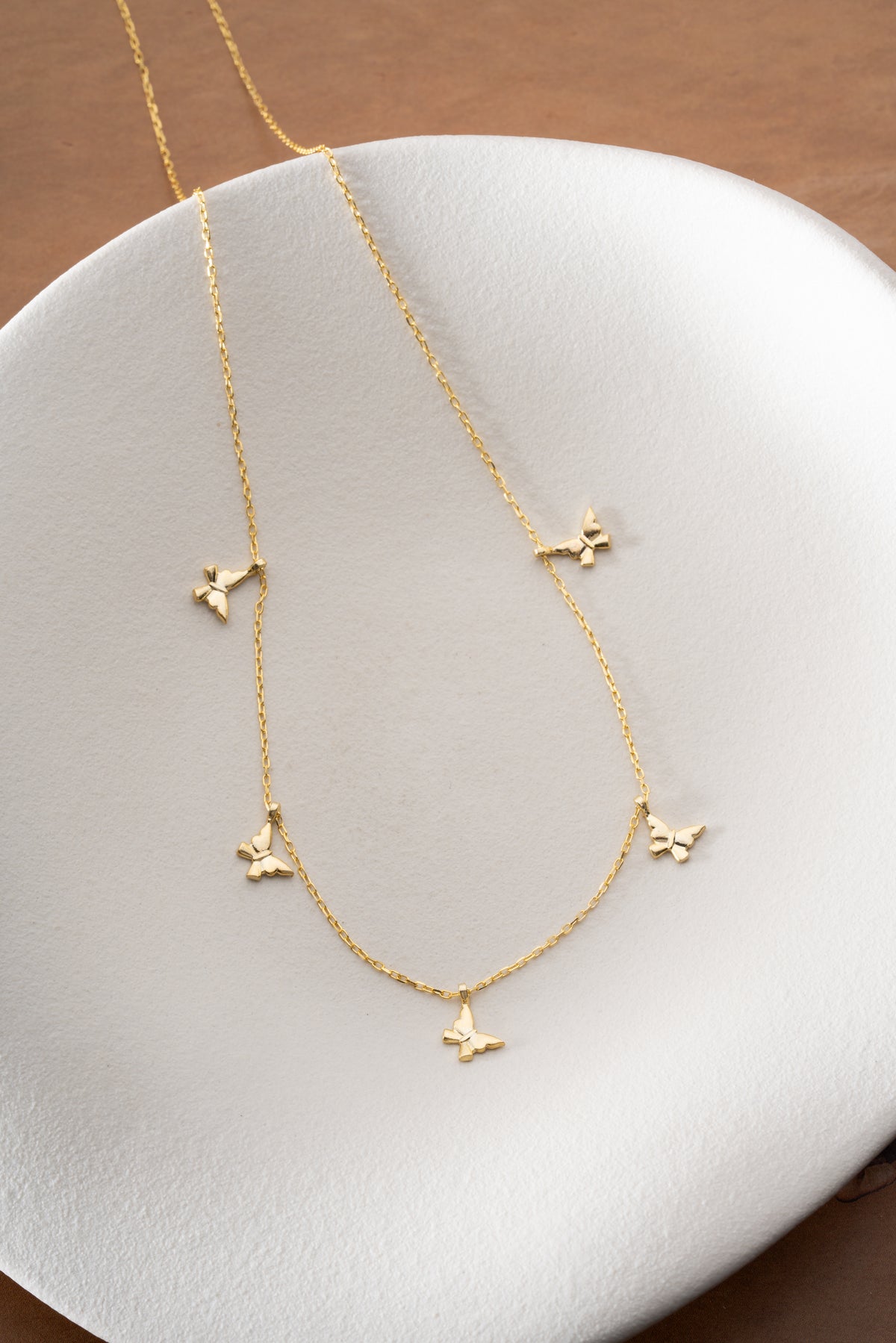 Butterfly Charm Station Necklace in Gold