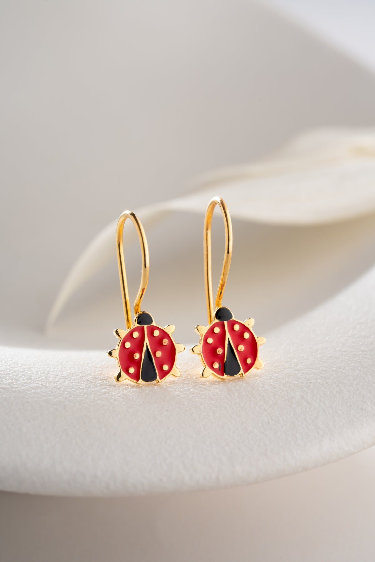 Ladybug Charm Drop Earrings in Gold