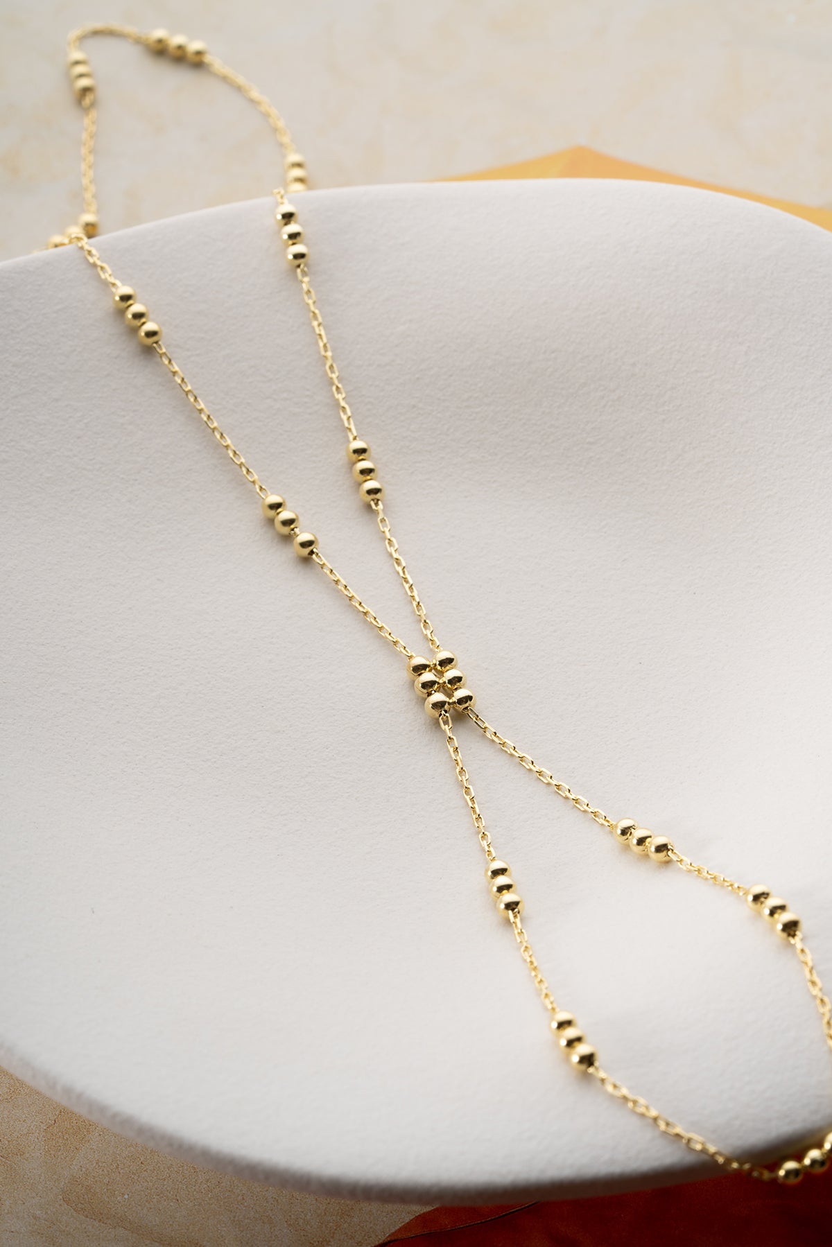 Gold Bead Station Hand Chain
