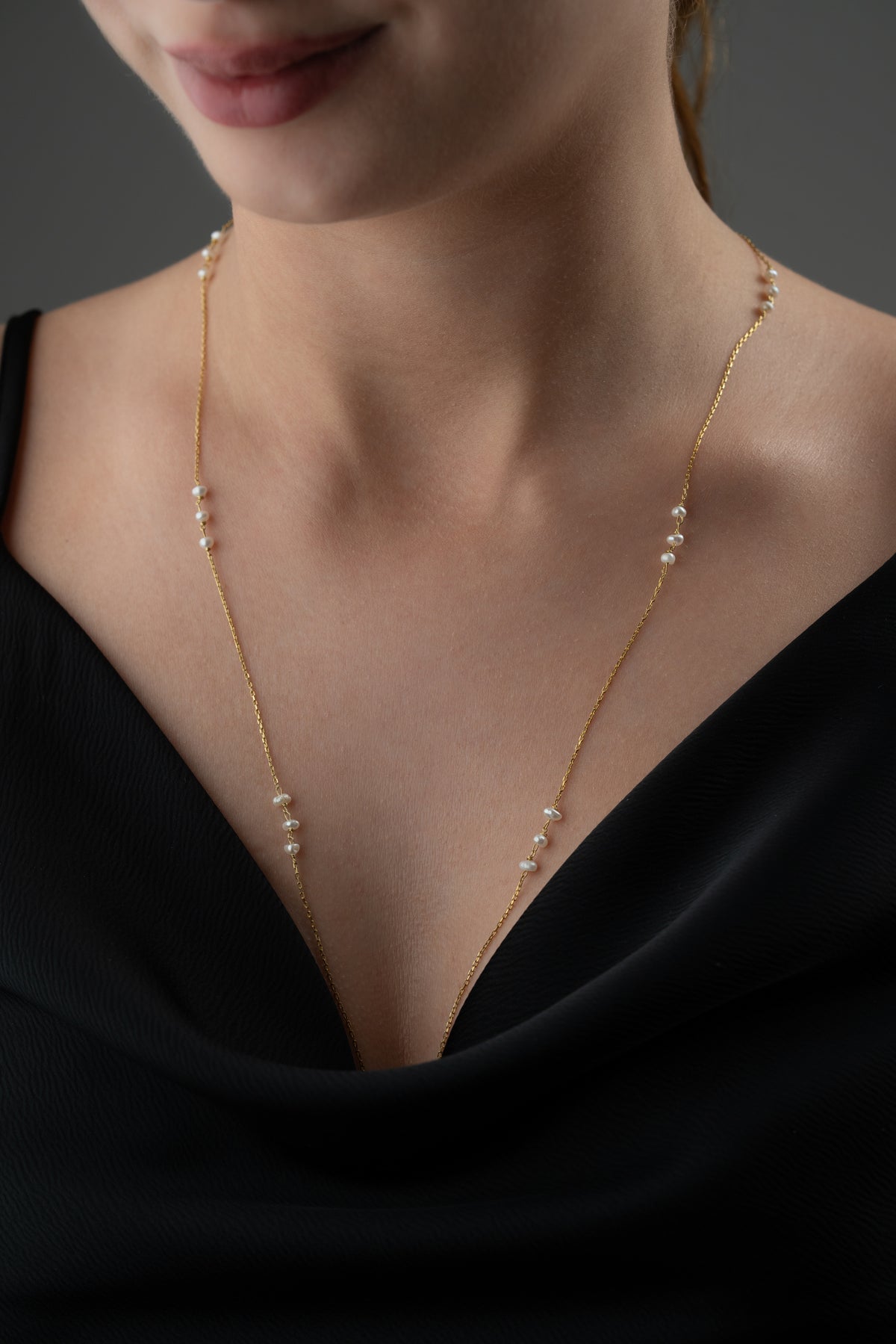 Long Pearl Station Necklace in Gold