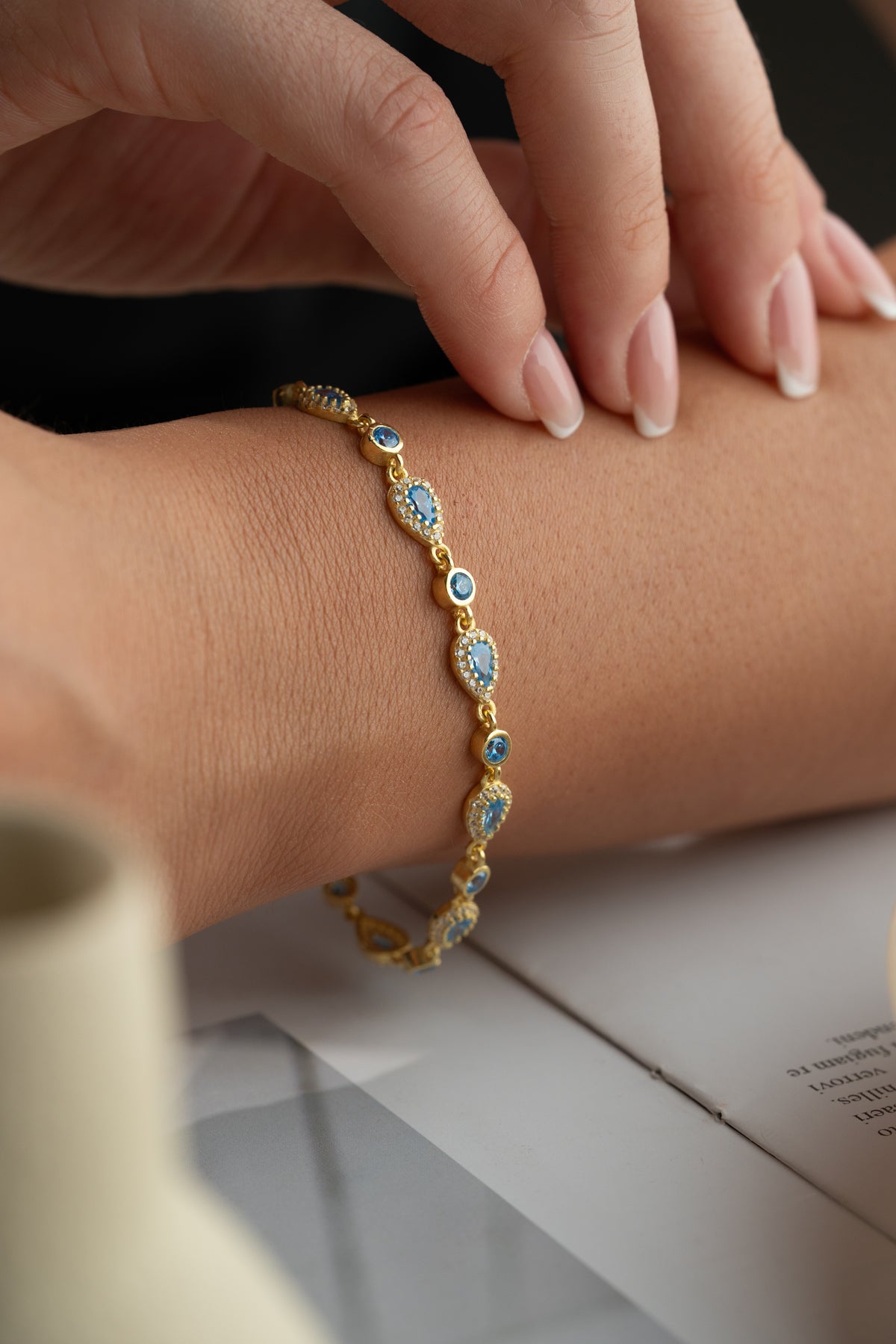 Blue Stone Teardrop Halo Bracelet