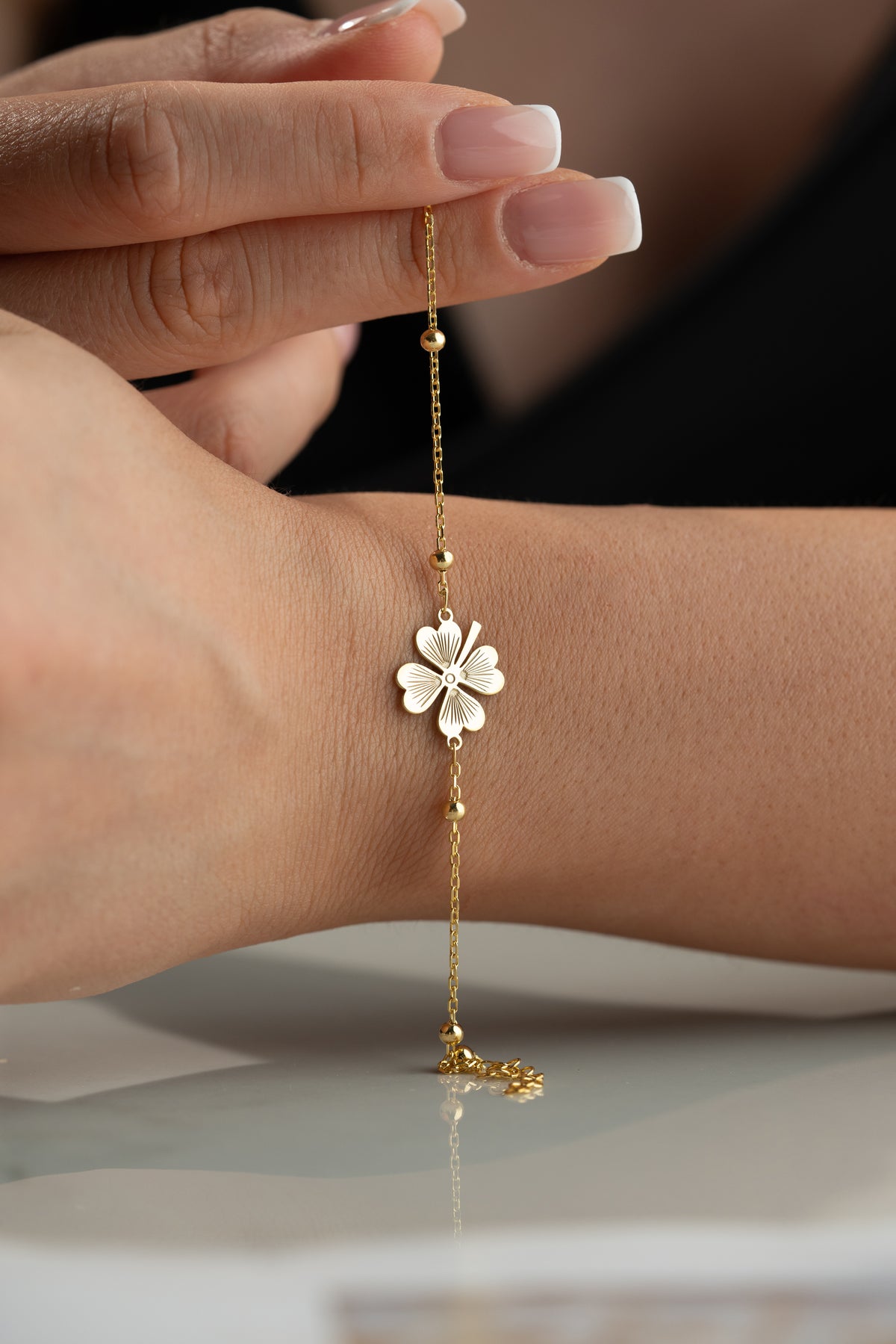 Four Leaf Clover Charm Bracelet in Gold