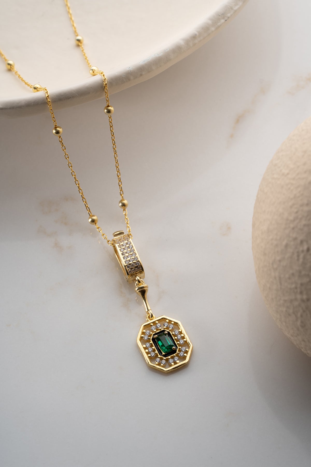 Gold Emerald Cut Halo Necklace