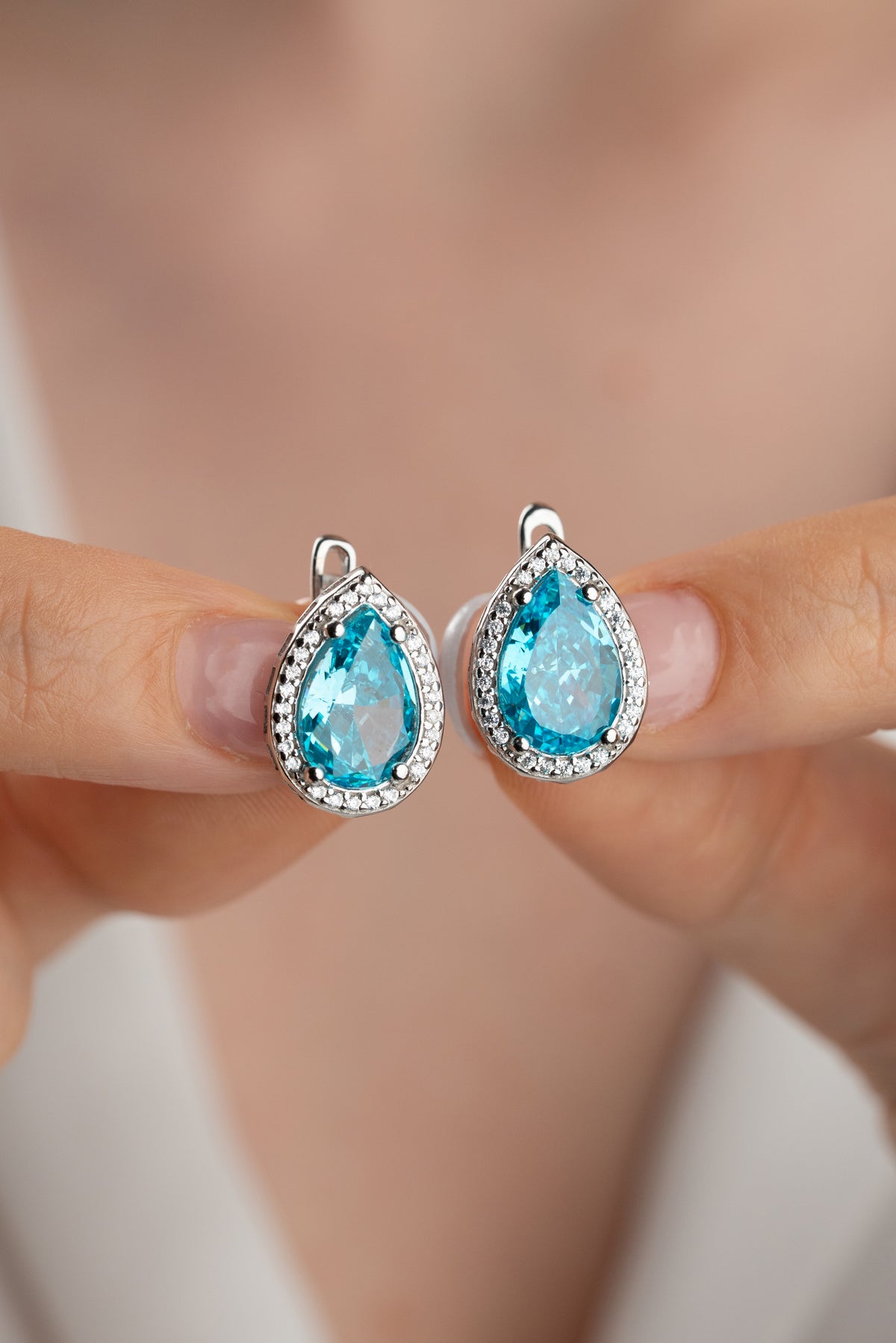 Aquamarine Teardrop Halo Earrings in Silver